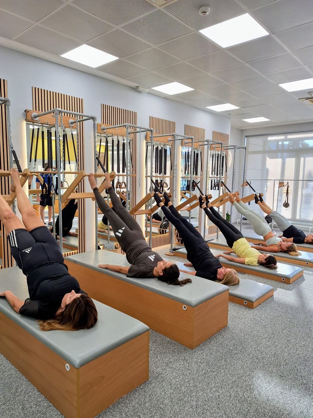 Aula na Unidade de parede, no Pilates Maia