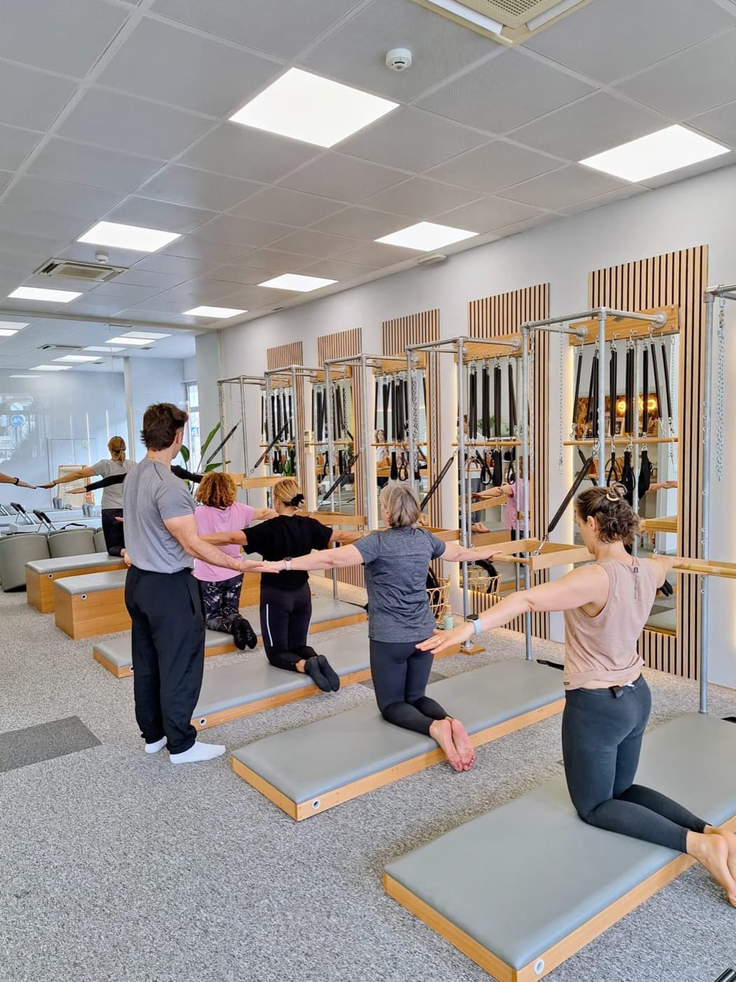Aula na Unidade de parede, no Pilates Maia