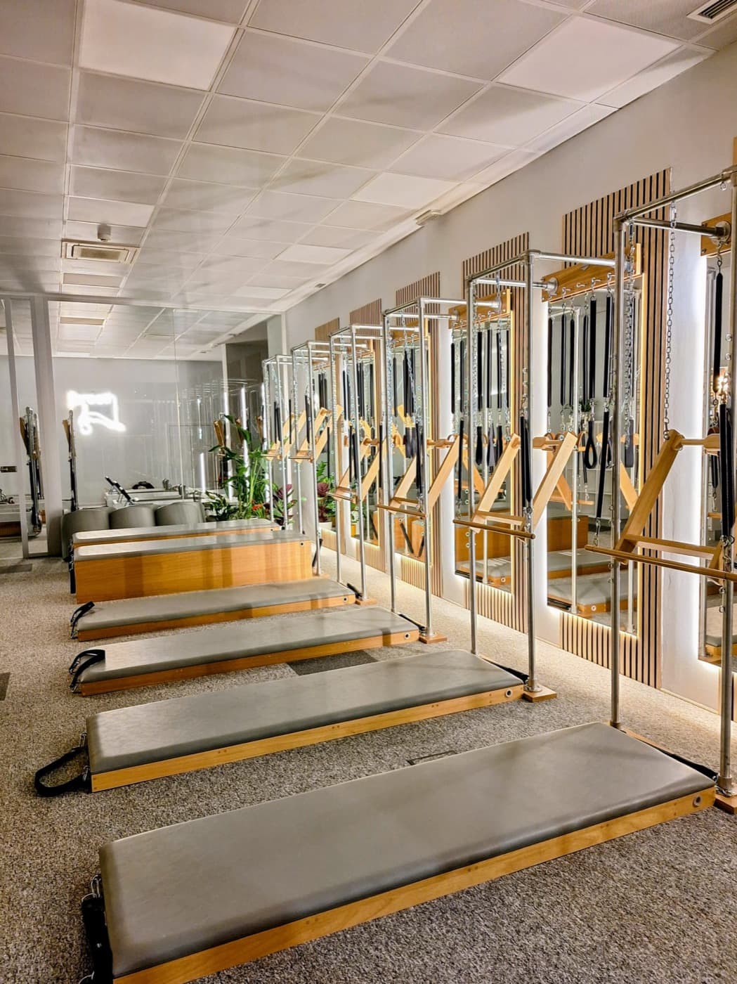 Aula na Unidade de parede, no Pilates Maia